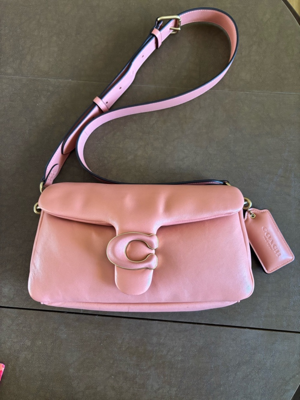 Coach Pink Leather Crossbody Bag with Gold 'C' Hardware.